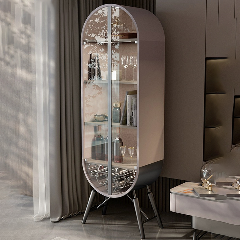 Elegant tall bar cabinet showcasing its glass doors and modern appeal in a living room setting.