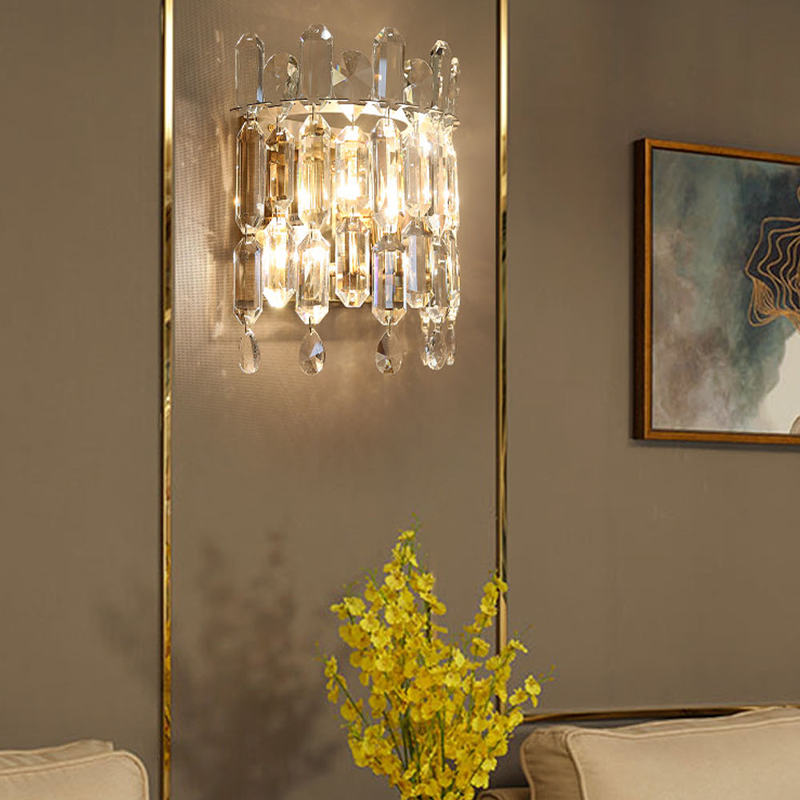 Close-up of the crystal shade on the luxury gold wall lamp, highlighting its intricate details.