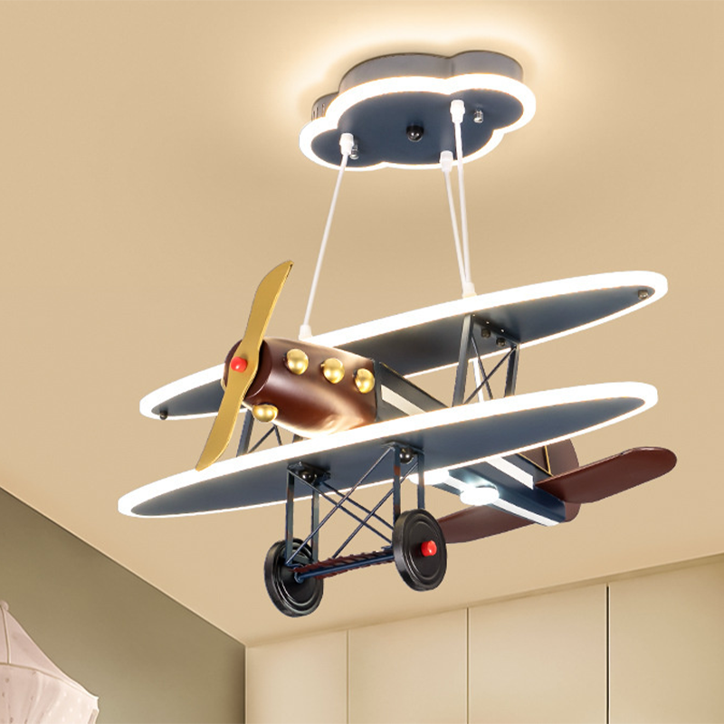 Airplane pendant light showcasing its unique design and soft glow in a child's room.