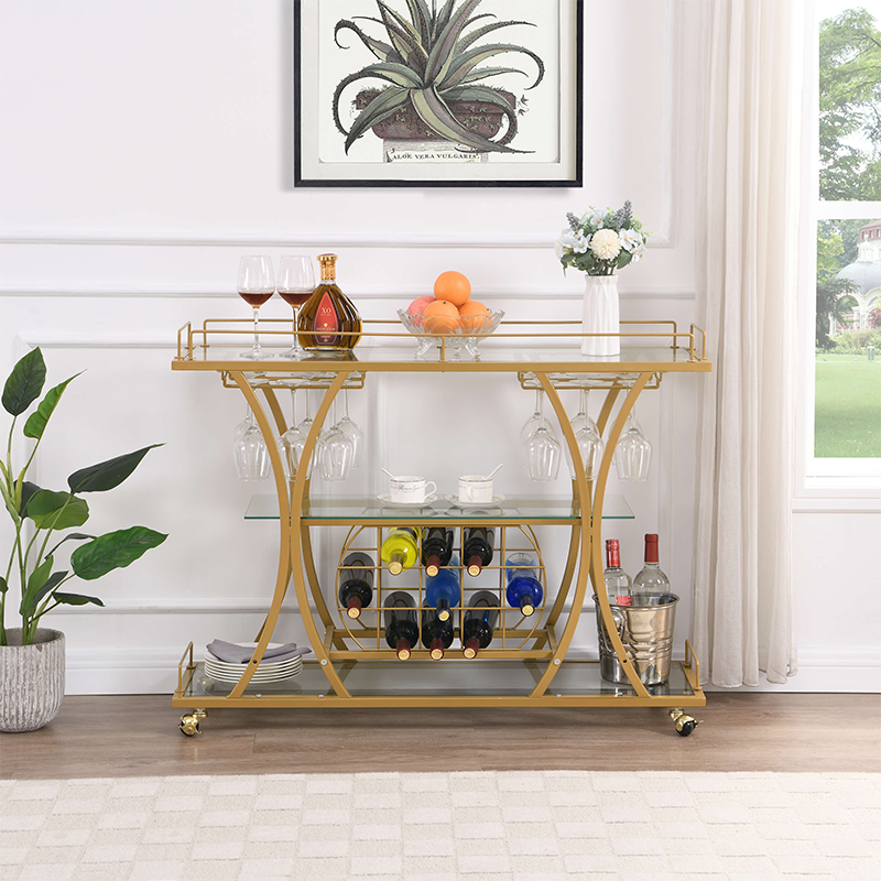 Elegant gold bar cart with tempered glass, showcasing wheels and wine rack from a side angle.