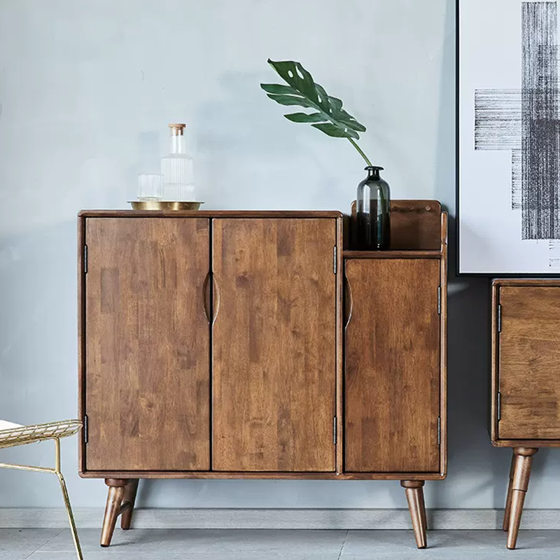 Close-up of drawers on the best wood shoe storage cabinet for entryway with birch wood finish