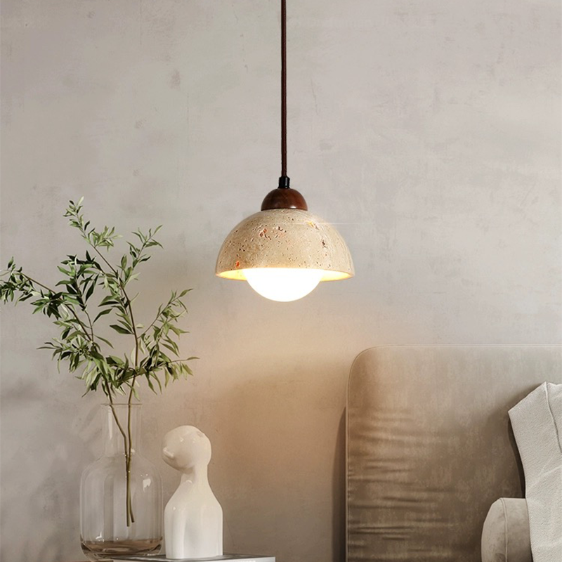 The pendant light in a cozy cafe setting, demonstrating its stylish modern lighting capabilities.