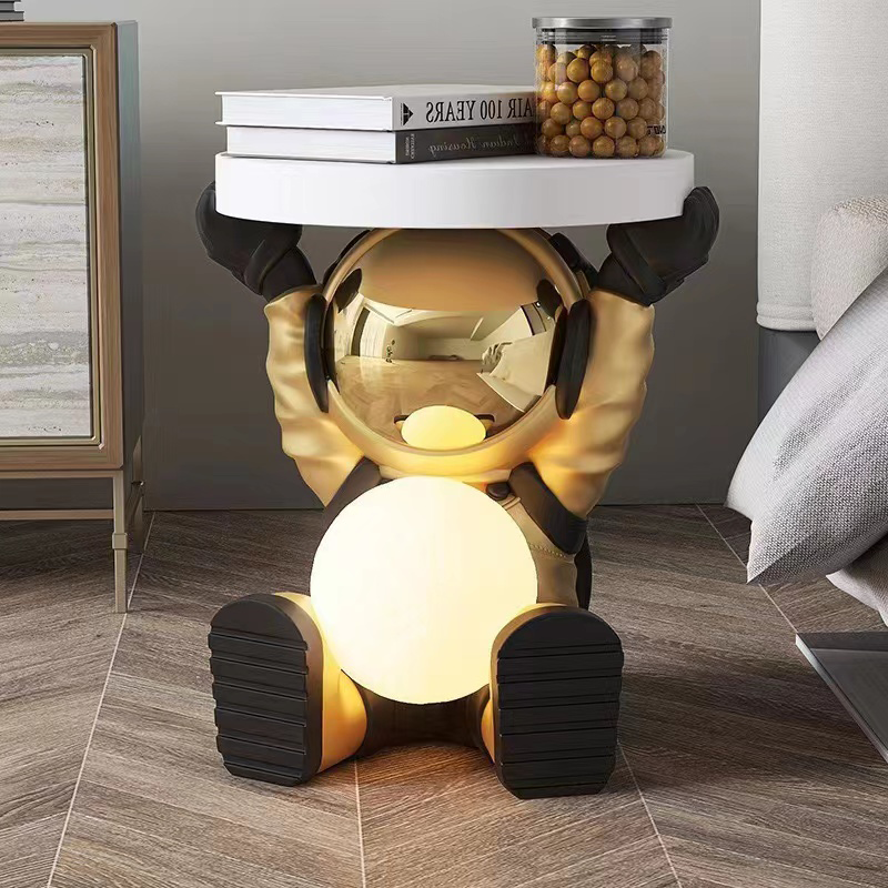 Galactic Astronaut Nightstand with glowing moon lamp at nighttime, perfect for bedroom decor.