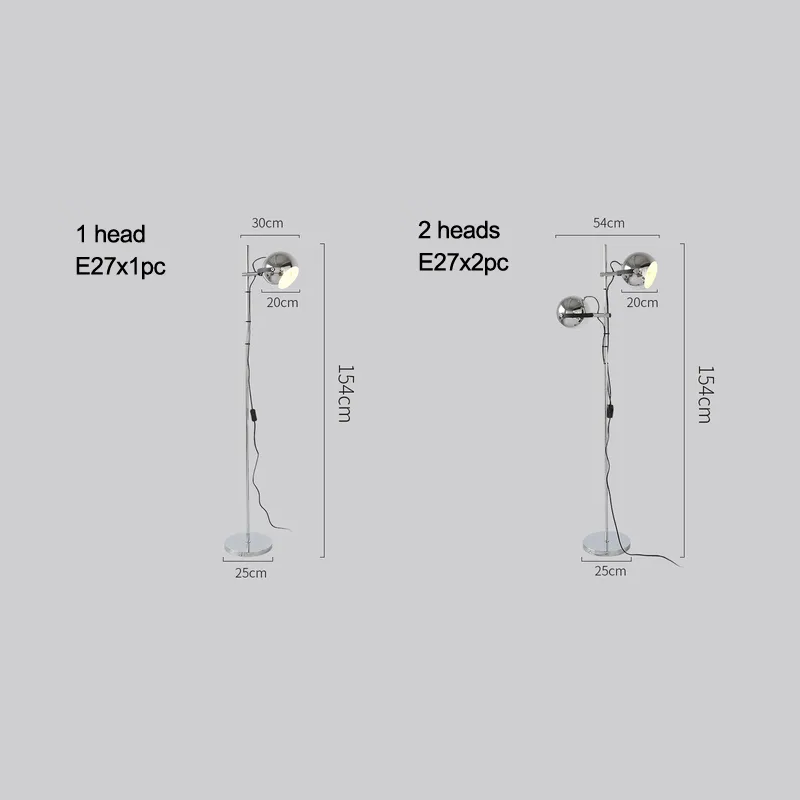 The Modern Chrome Bauhaus LED Floor Lamp illuminating a minimalist office space.