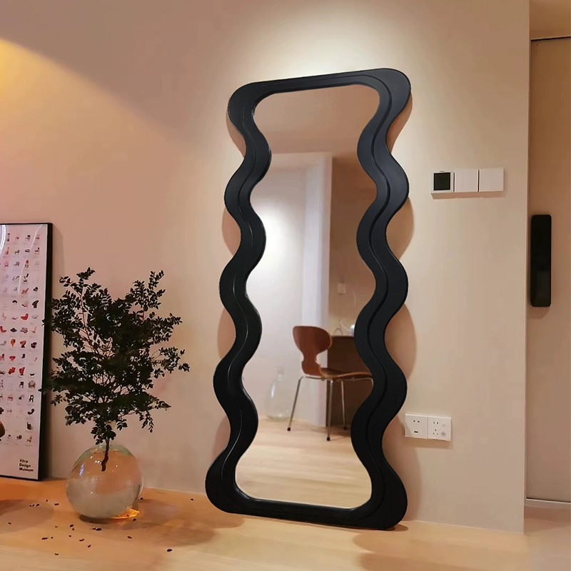 Elegant scallop full length mirror showcasing its unique design in a stylish hallway.