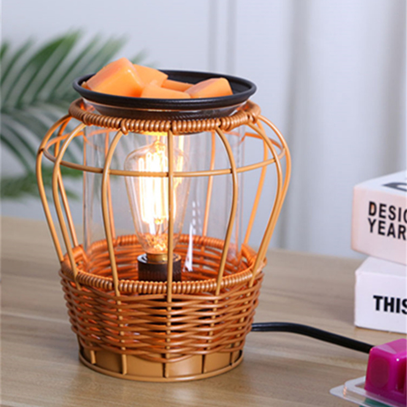Rustic bamboo rattan aromatherapy lamp in a cozy bedroom setting