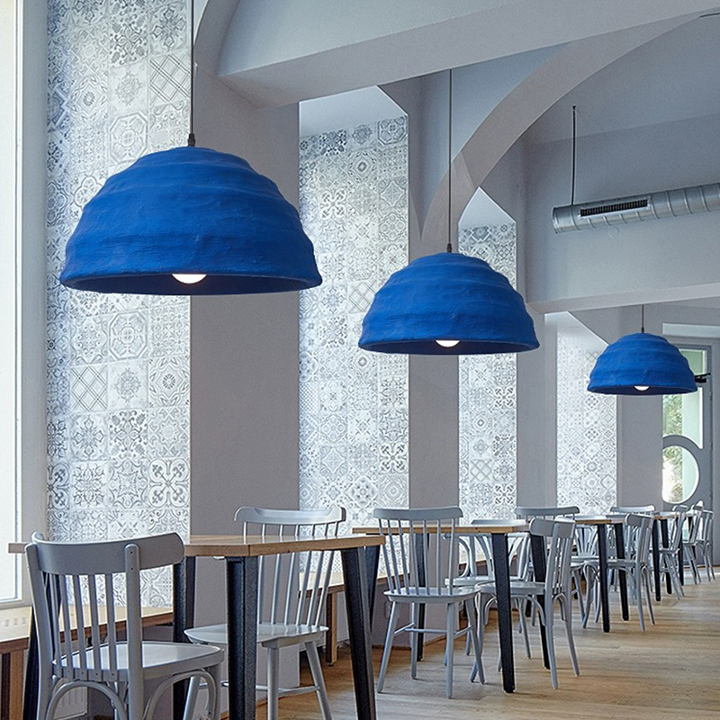 Chic Klein Blue Dome Pendant Light hanging above a dining table