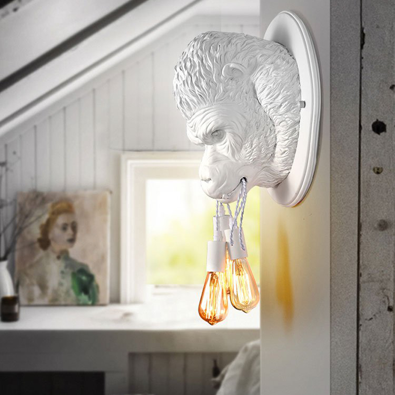 Nordic Gorilla LED Wall Sconce viewed from the side in a cozy living room setting.