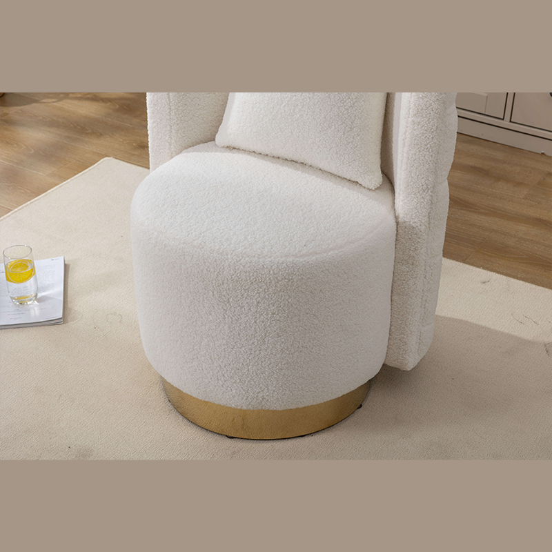 Cozy living room featuring a luxury cream accent chair with gold legs.