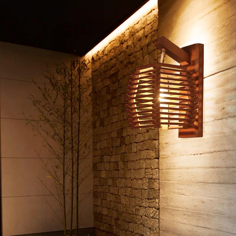 Elegant bamboo lantern wall lamp showcasing natural wood finish in a cozy living room setting.