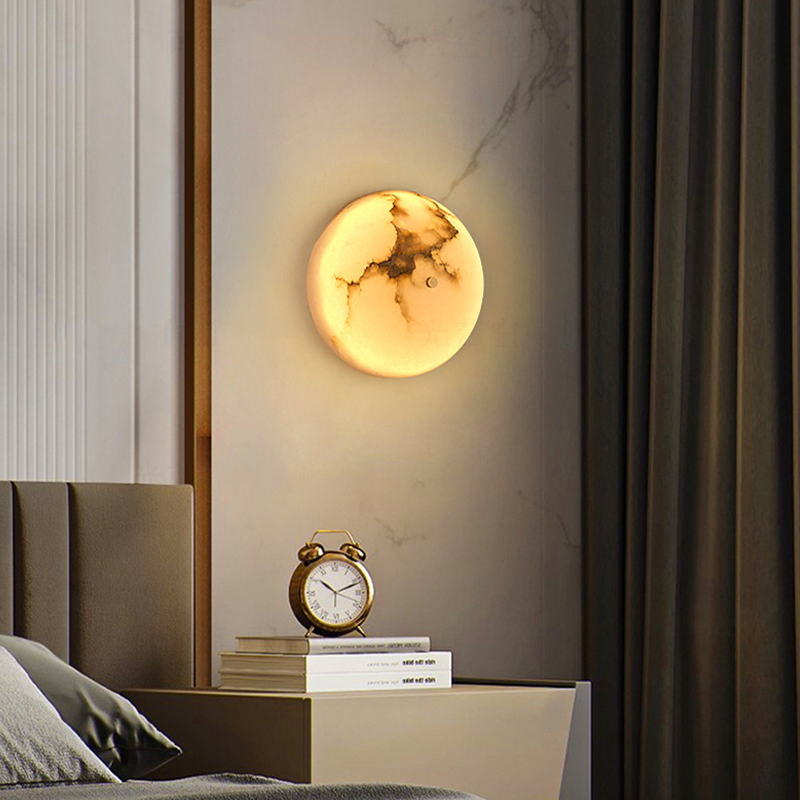 Elegant marble LED wall sconce showcasing the intricate marble pattern from the side