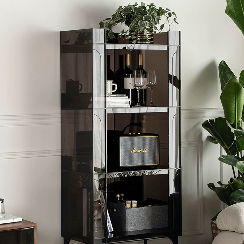 Elegant acrylic display cabinet in black crystal with books and decor