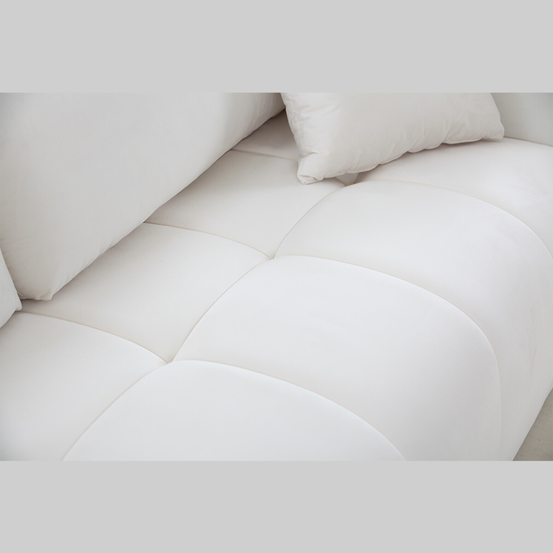 Cozy modern couch in beige fabric, designed for comfort and style in any home.