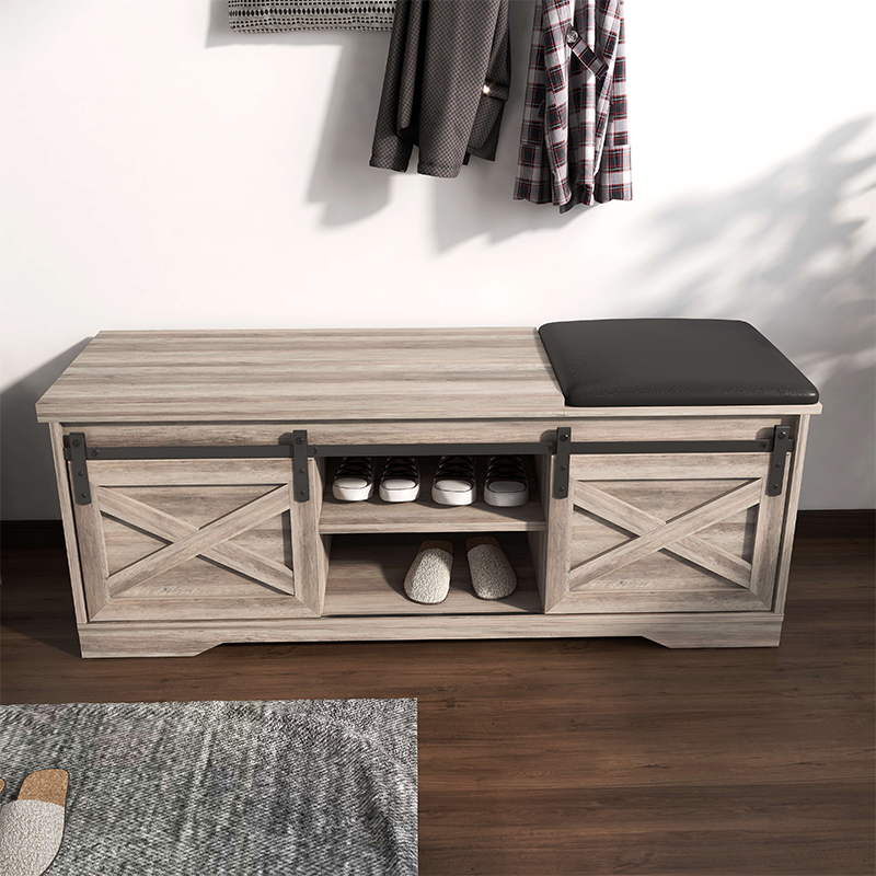 Modern gray walnut entryway storage bench with shelves and cushion, angled view.