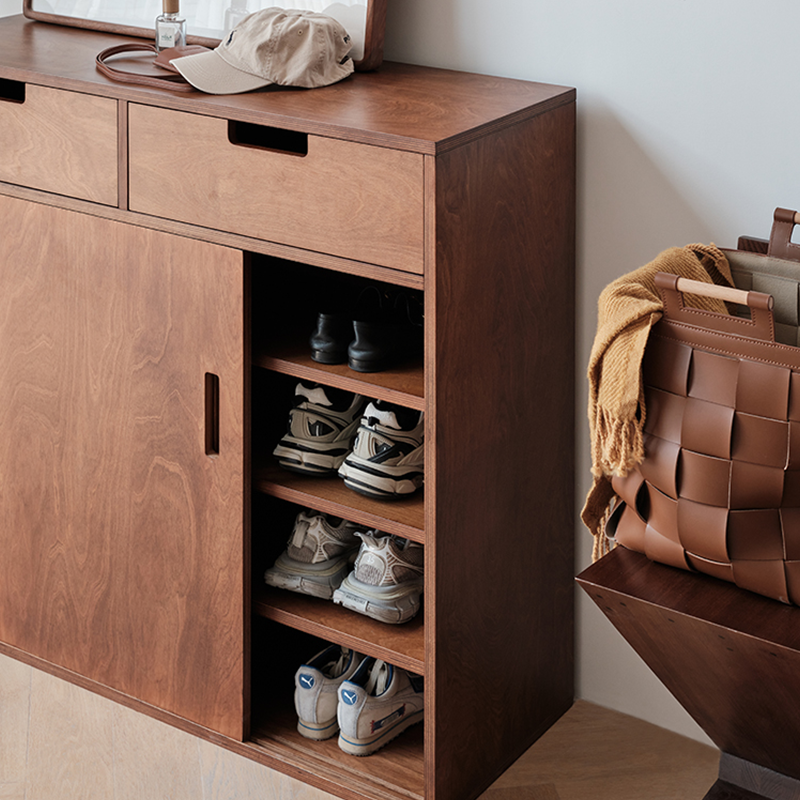 Living room setup featuring the modern sideboard, highlighting its functionality and style.