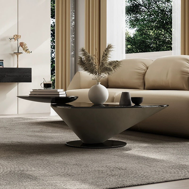 Sleek Italian black and gray minimalist coffee table in a stylish living room setting.