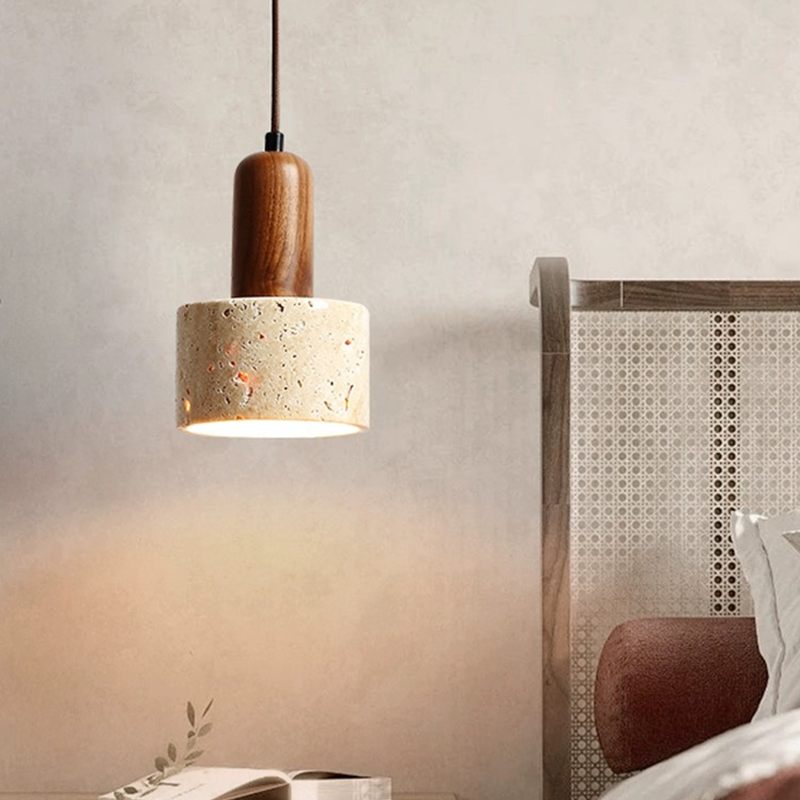 Luxe warm light pendant showcasing the yellow cavity-stone from a side angle, ideal for dining rooms.