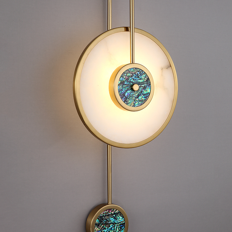 Elegant gold copper wall sconce showcasing its sophisticated design in a modern living room.