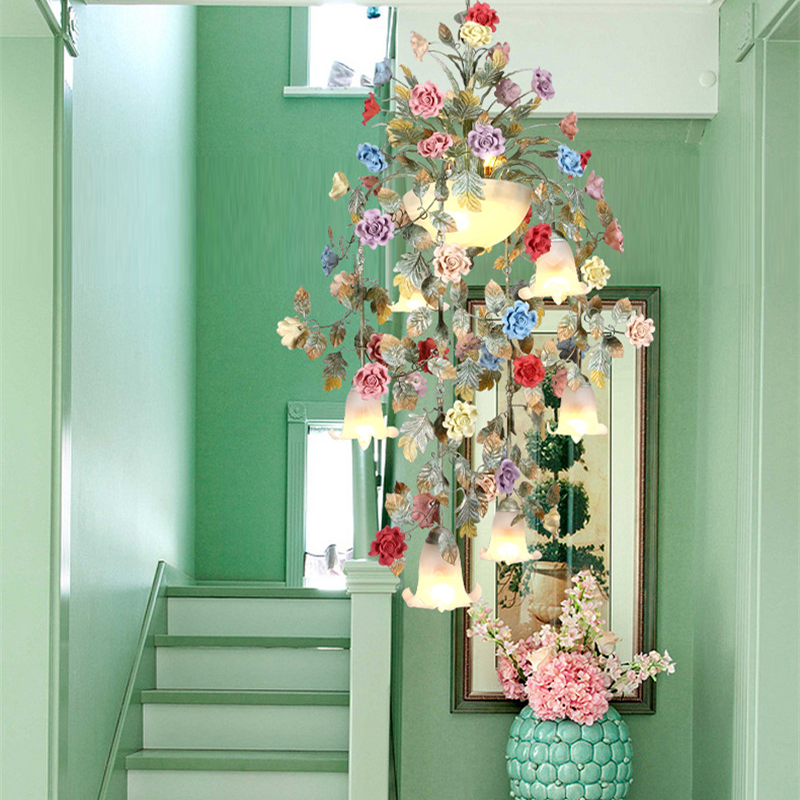 View of the chandelier installed in a nursery, showcasing its soft, inviting light.
