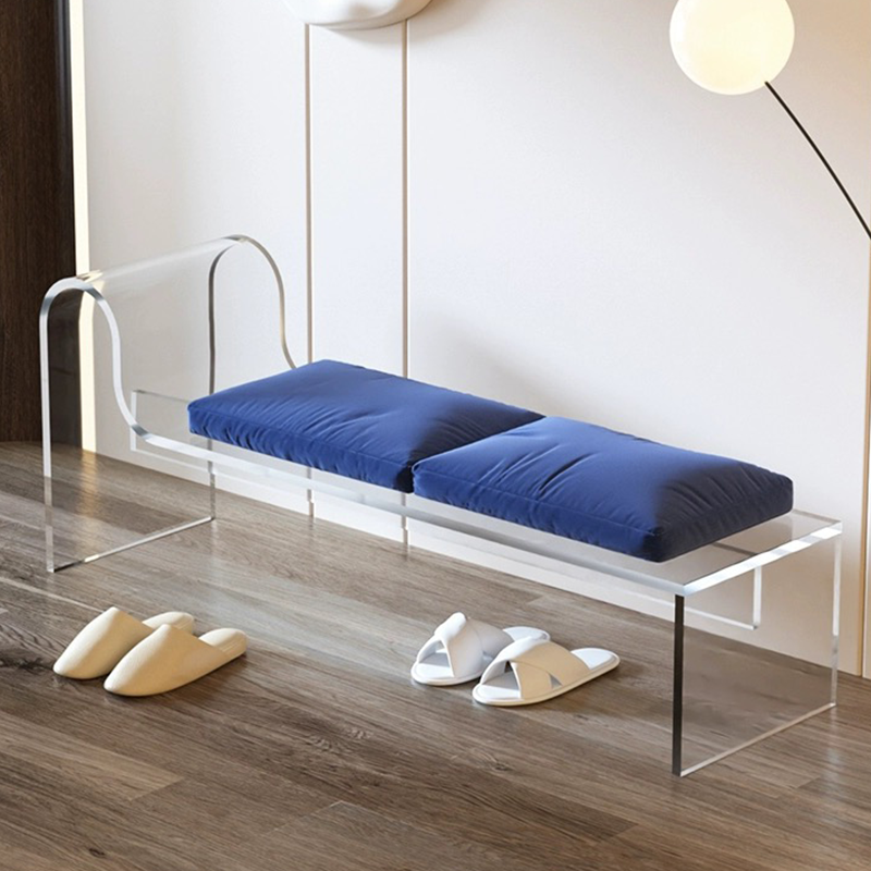 A blue acrylic bench showcasing a sleek design, perfect for resting.