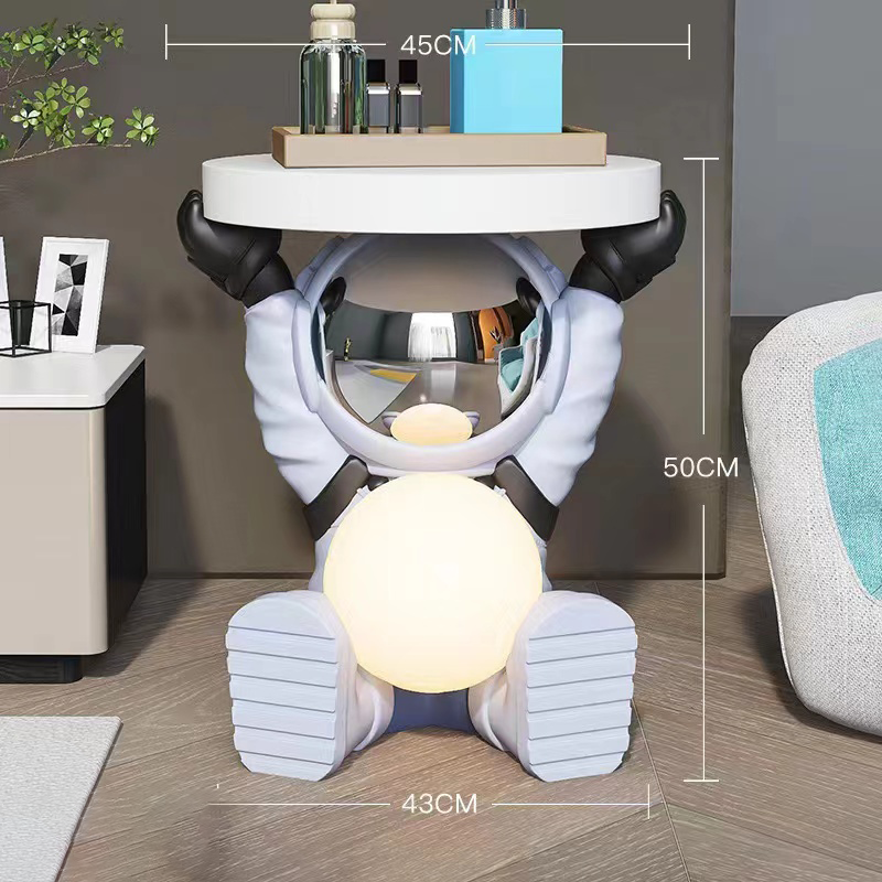 Galactic Astronaut Nightstand with glowing moon lamp at nighttime, perfect for bedroom decor.