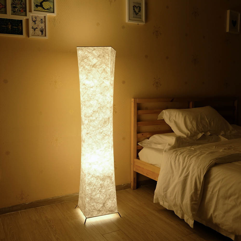 Nordic Elegance LED floor lamp showcasing soft light in a cozy living room setting.