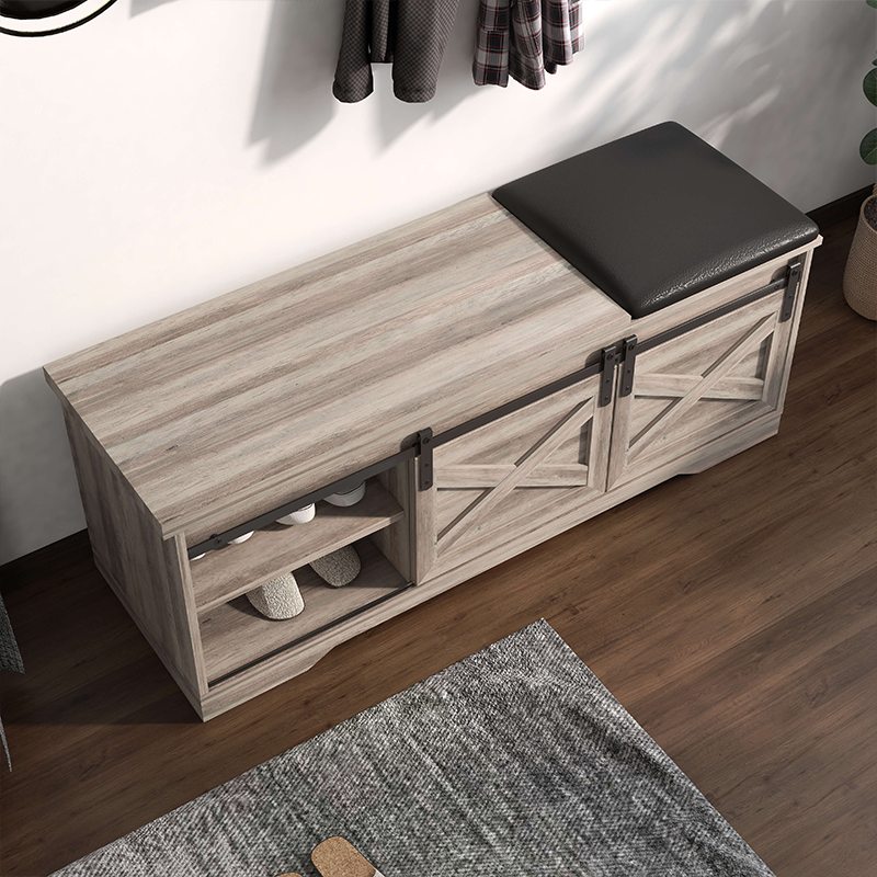 Stylish farmhouse shoe bench with barn door, perfect for small spaces.