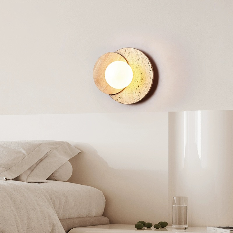 Elegant view of the wooden wall lamp against a bright background, highlighting its smooth texture and modern design.