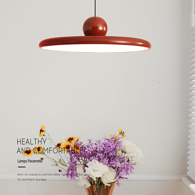 Close-up of Retro Flying Saucer Pendant Light showcasing the green finish.