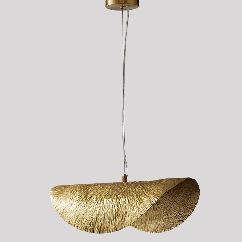 Close-up view of the handmade copper pendant light highlighting its unique hammered finish, suitable for any modern space.
