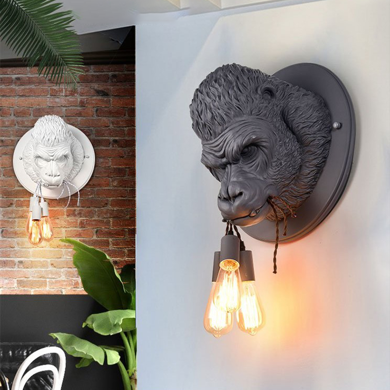 Nordic Gorilla LED Wall Sconce viewed from the side in a cozy living room setting.