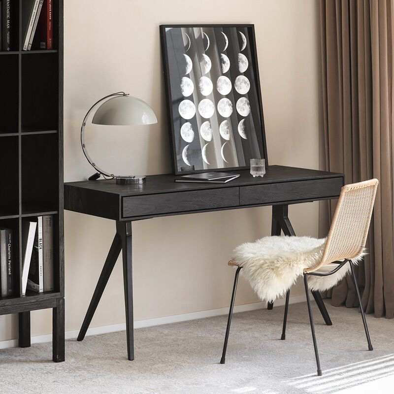 Side view of the minimalist desk highlighting the two spacious drawers.