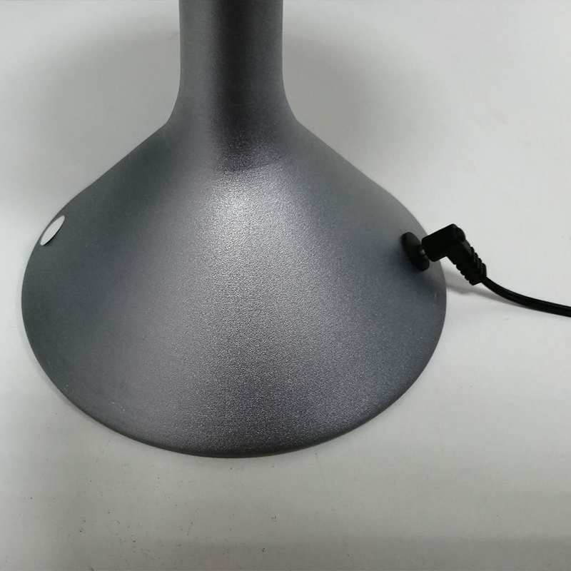 Side view of the UFO 3D smart wireless table lamp showcasing its sleek design and LED light.