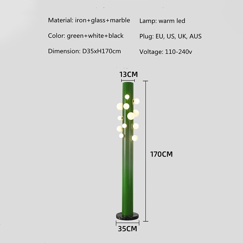 Modern lighting ambiance created by the green glass floor lamp in a spacious foyer.