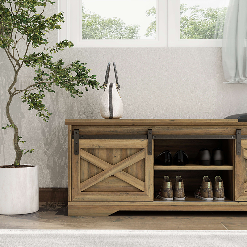 Storage bench in a stylish entryway, holding shoes and providing seating