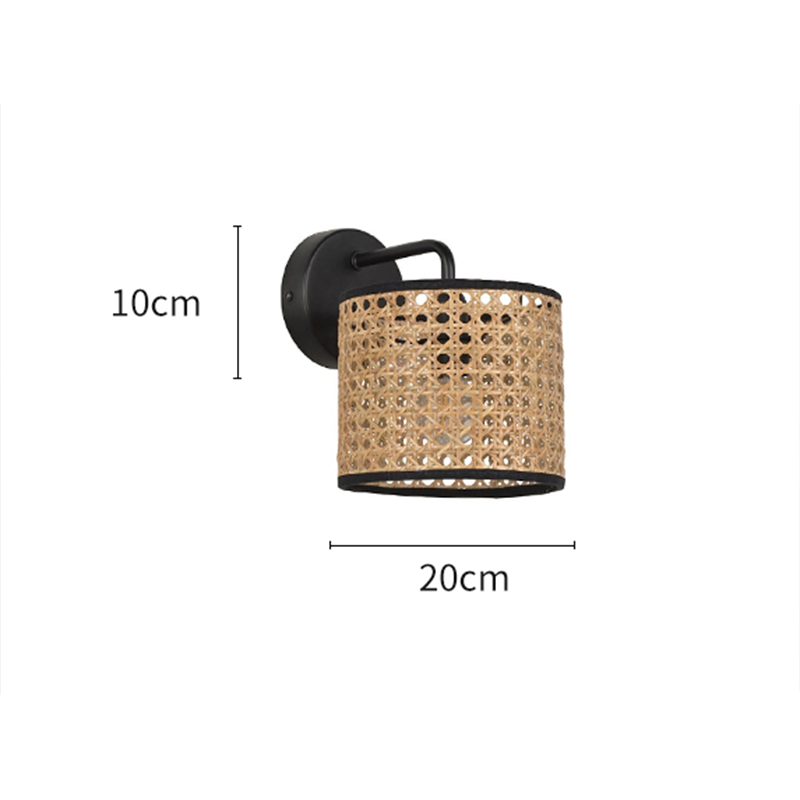 Close-up of the handmade woven drum rattan wall light, highlighting its intricate craftsmanship.