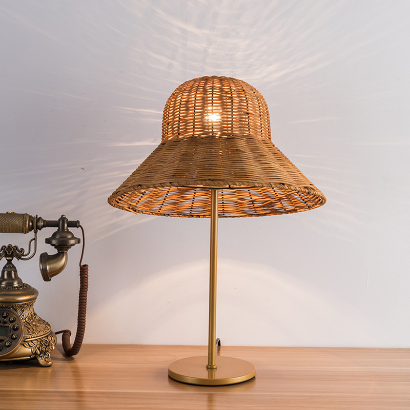 Side view of the bamboo table lamp illuminating a cozy living room.
