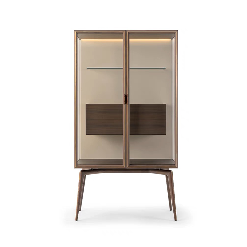 Close-up of the cabinets stainless steel accents and walnut finish, highlighting its luxurious materials.