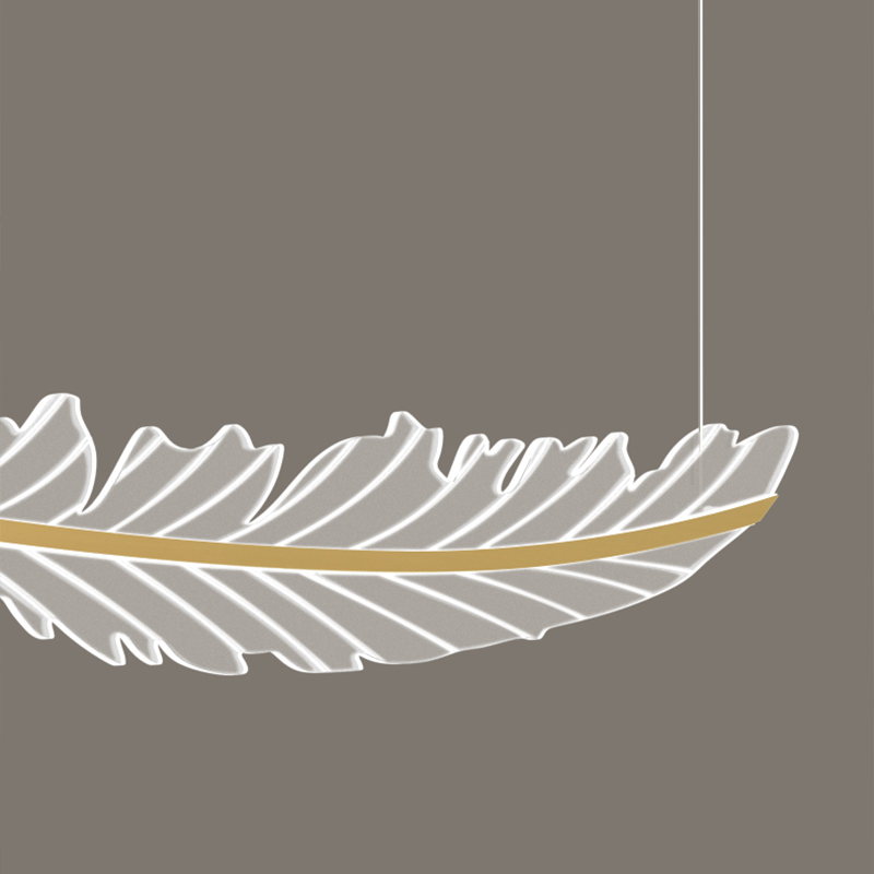 Close-up view of the gold leaf pendant lamp, highlighting the brushed gold finish and LED lights.