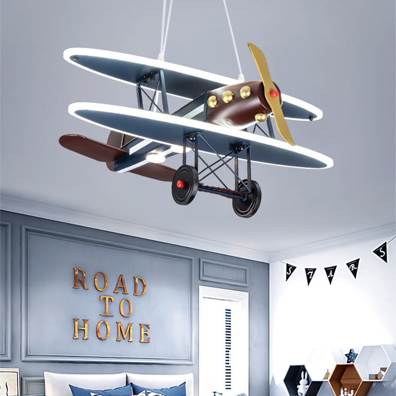 Airplane pendant light showcasing its unique design and soft glow in a childs room.