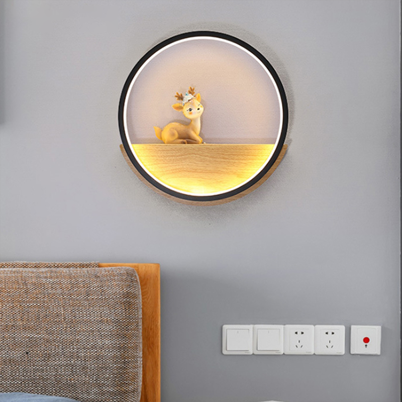 Rustic Deer Antlers LED Wall Sconce installed in a cozy dining room setting.
