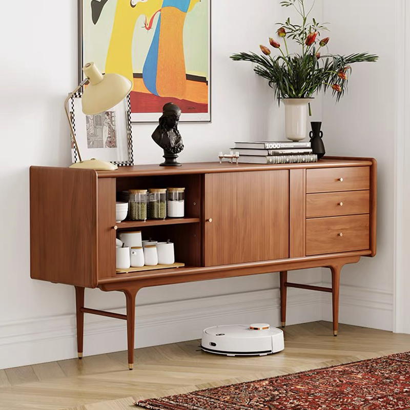 Top view of the cabinet filled with decorative objects, demonstrating its spacious surface.