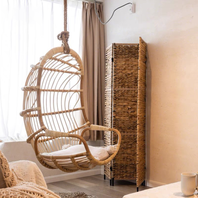 Elegant Rattan Indoor Glider Swing Chair in natural wood finish, perfect for cozy balconies.
