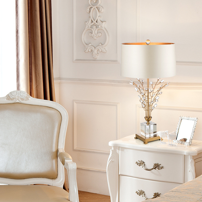 Close-up of a high-end decorative crystal lamp with fabric shade, perfect for bedrooms or study areas, highlighting the detailed craftsmanship.