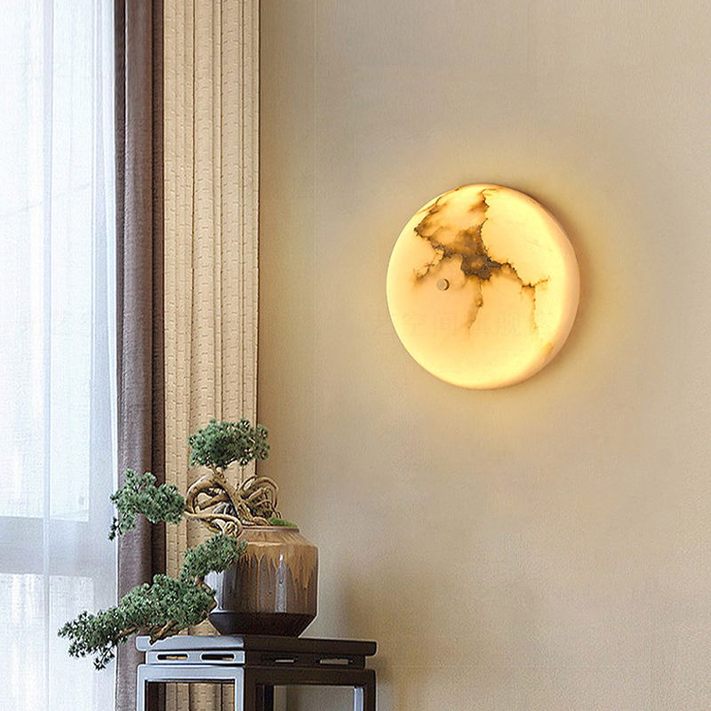 Close-up view of the marble shade on the LED wall sconce highlighting its modern aesthetic