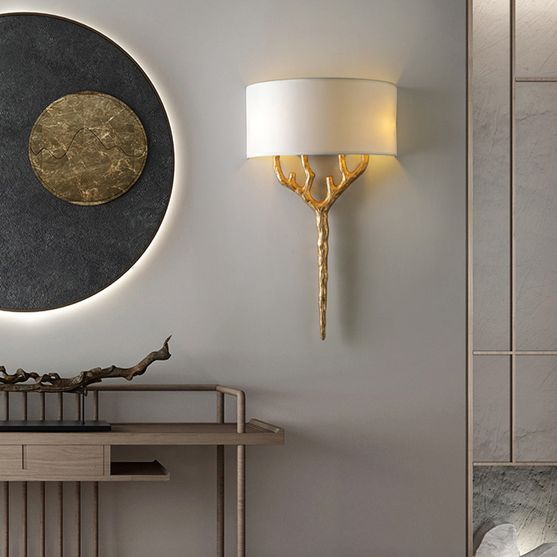 Tree branch decorative wall light for dining area showcasing warm glow.
