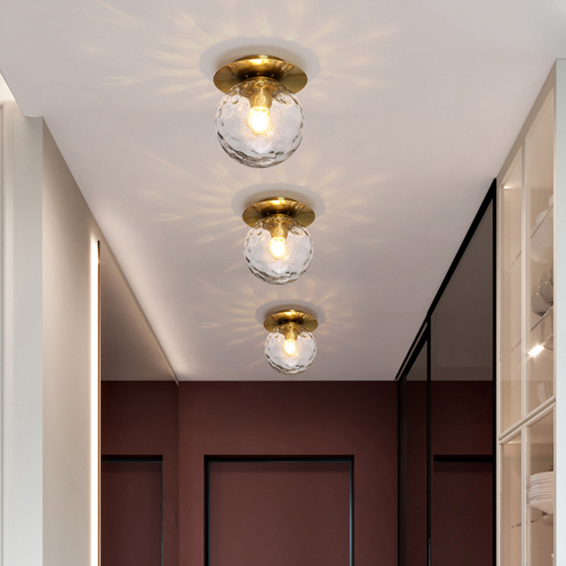 Flush mount light installed in a stylish bedroom, illuminating the space with a warm glow.