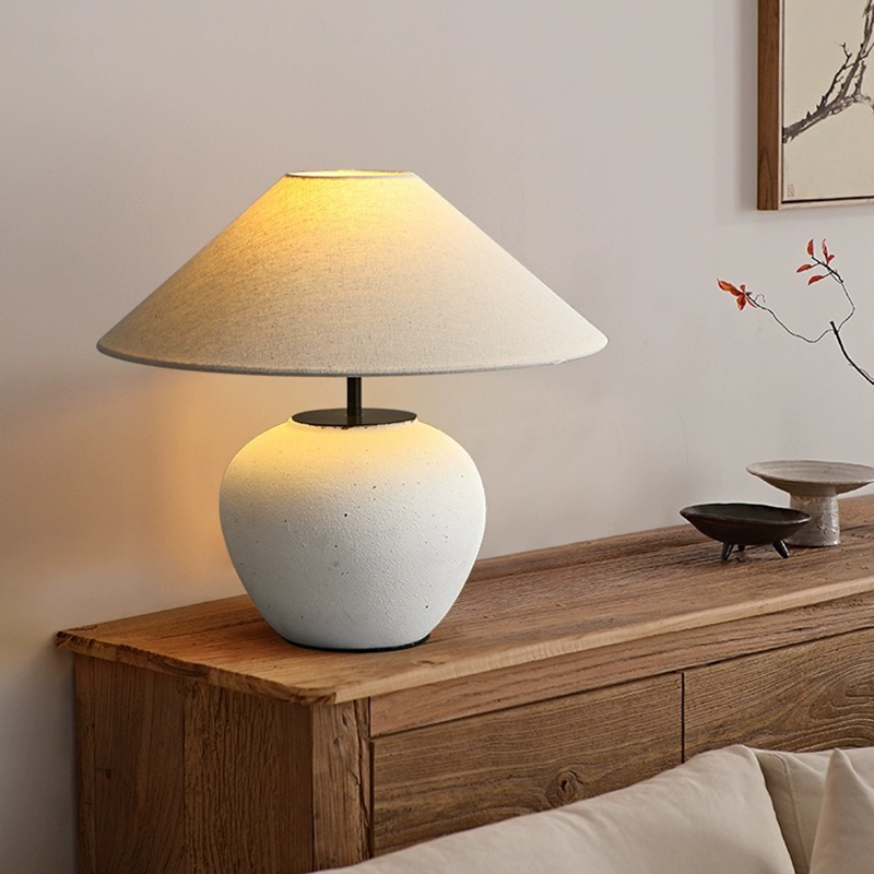 Lifestyle shot of the table lamp in a cozy living room setting, enhancing the Japanese decor.