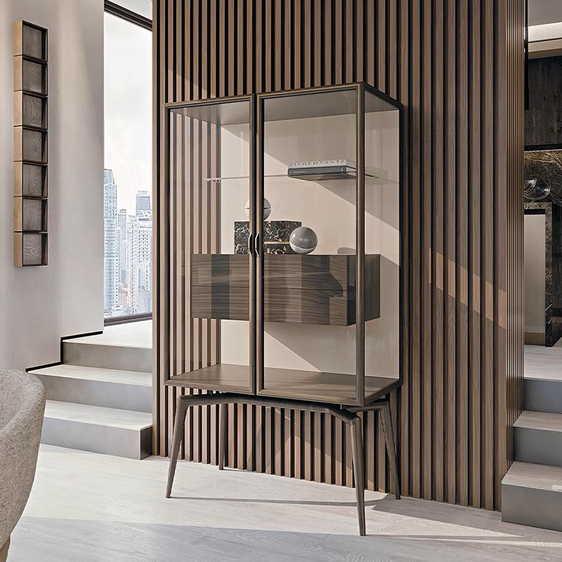 Close-up of the cabinets stainless steel accents and walnut finish, highlighting its luxurious materials.