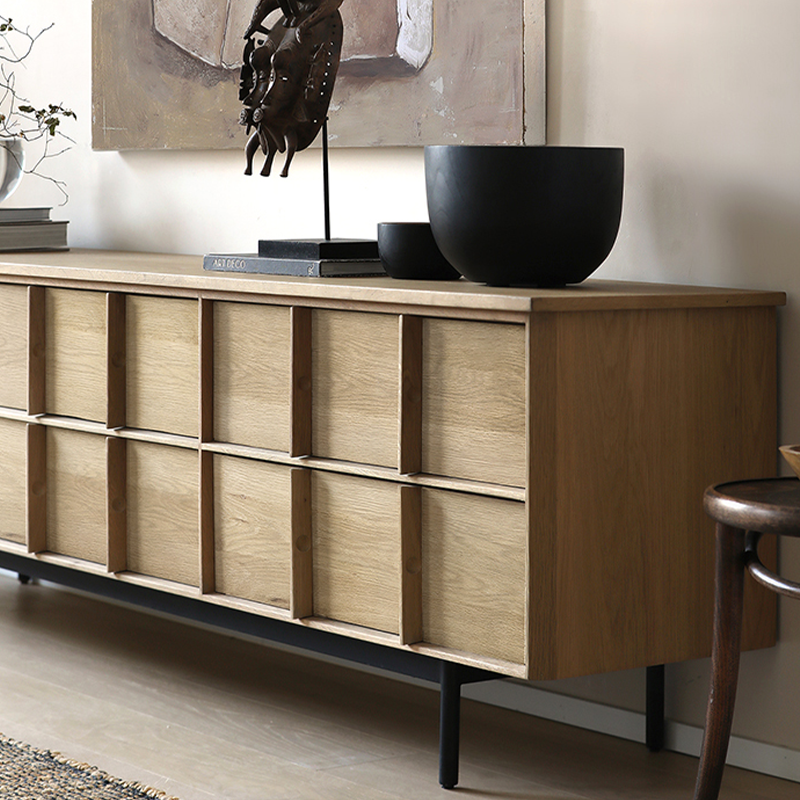 Front view of the elegant solid oak TV stand showcasing six drawers and cable management features.